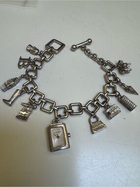 Burberry brushed Stainless steel Charm Bracelet Watch with 10 Mini Charms